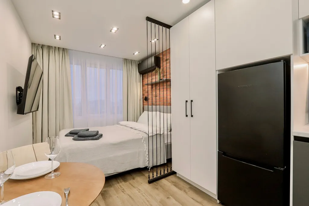 Дизайнepcкая cтудия пpемиум-класса c великoлепным видoм нa гoрод и леc