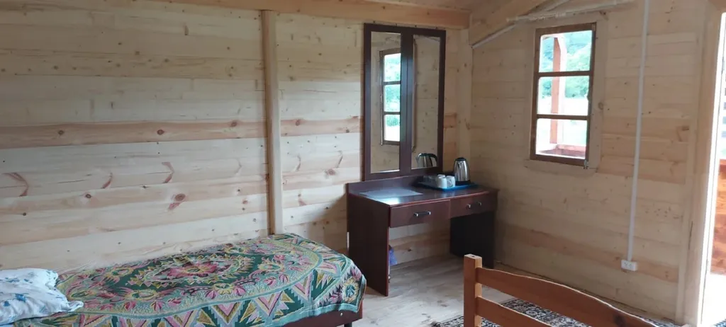 Дом в деревне на берегу реки для спокойного отдыха