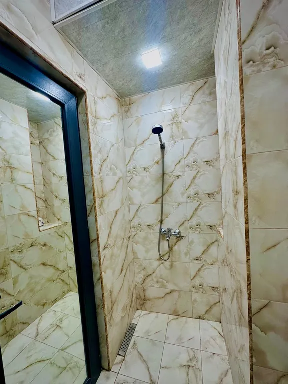 В центре рядом с музеем Сергея Параджанова