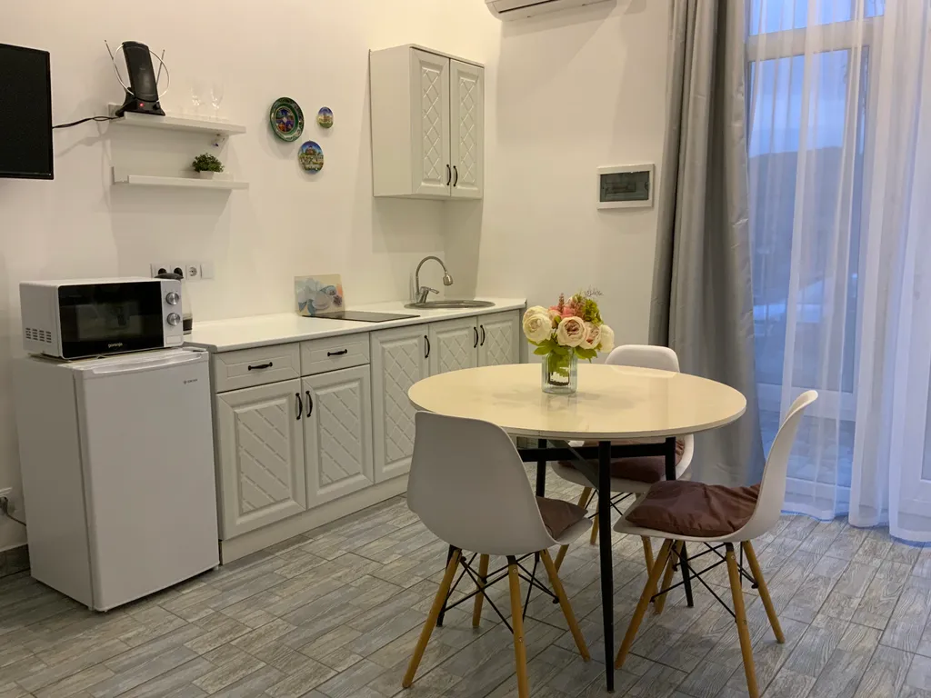 Семейная студия с террасой видом на горы и море