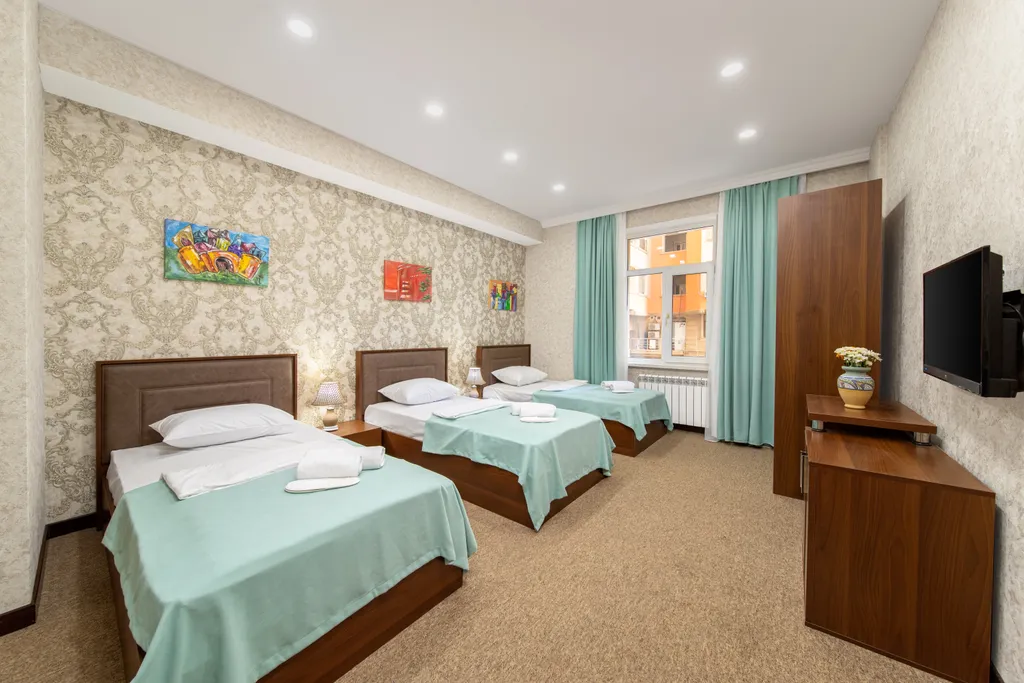 Квартира Стандартный трехместный номер — аренда посуточно в Баку