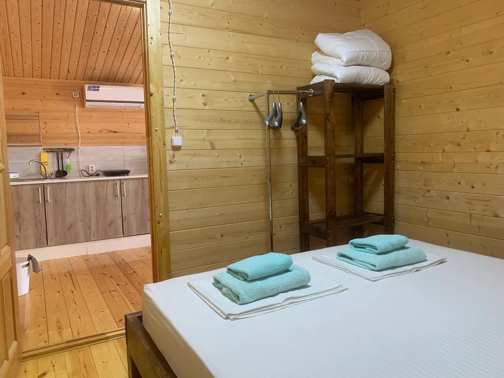 Индивидуальный трехкомнатный эко-дом с террасой и кухней Ветер Перемен