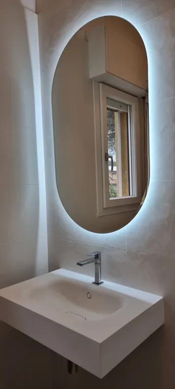 Двухэтажная квартира с частным двориком в Линиано Саббьядоро на море