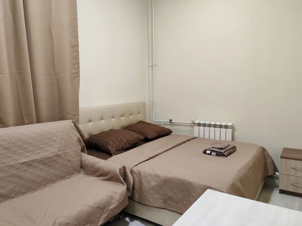 Светлая квартира с большими окнами и высокими потолками