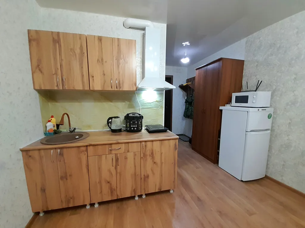 Коричневая студия в центре