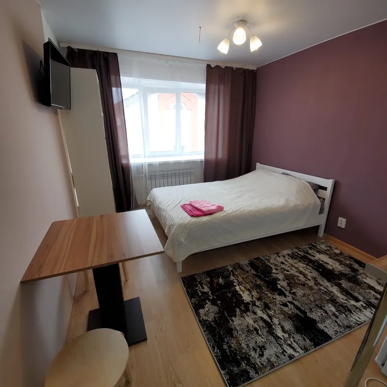 Апартаменты " Как дома" Студия 12 рядом с университетом.