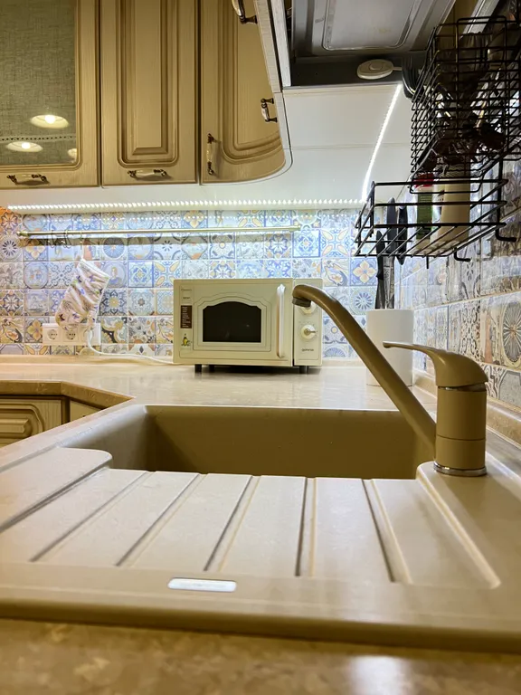 Светлая квартира с мансардой в центре города