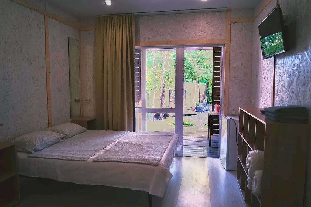 Трёхместный номер с летней кухней на лоджии, теплым бассейном