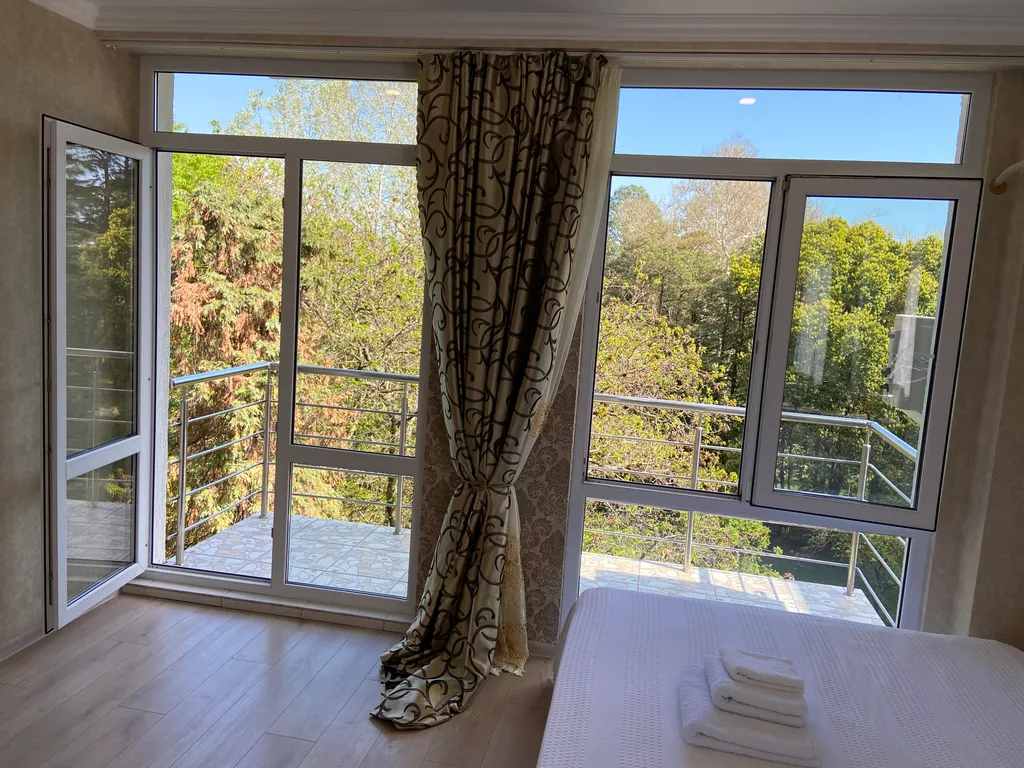 Квартира Квартира Уютная студия с видом и ароматами Южного дендрологического парка — Сириус