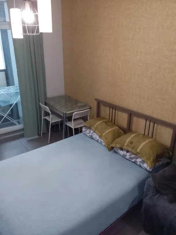 Студия в современном новом доме на проспекте Строителей