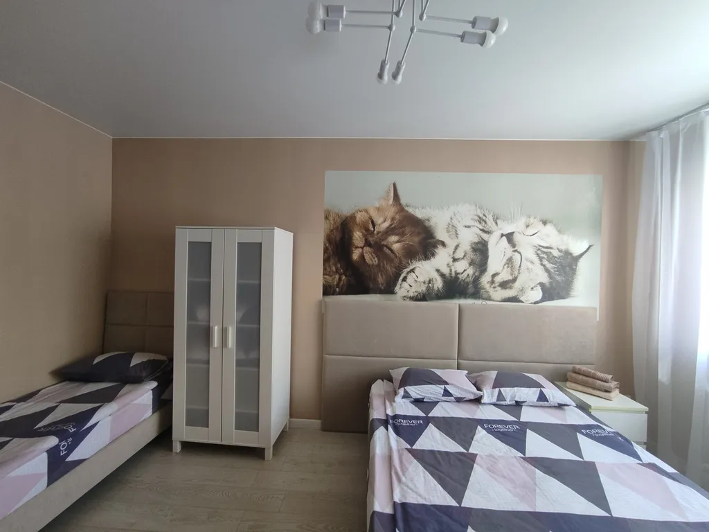 Большая семейная квартира до 5 гостей рядом с Волгой