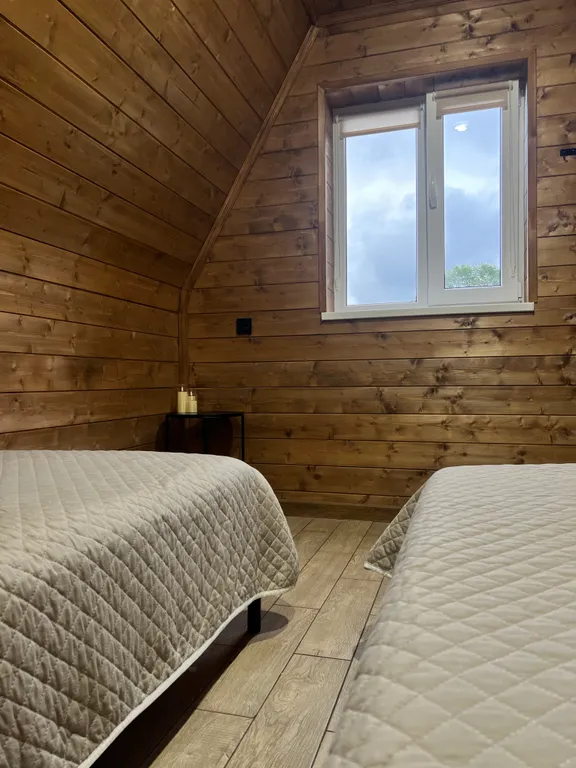 Уютный А-frame коттедж в зеленой части города