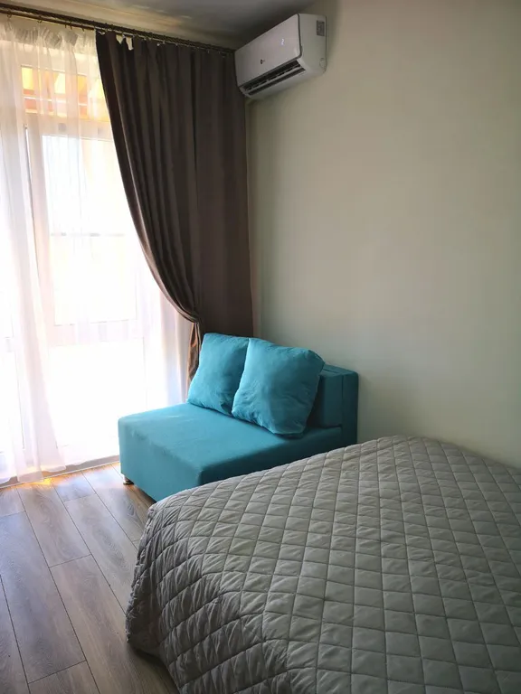 Студия комфорт с видом на горы и бассейнами во дворе