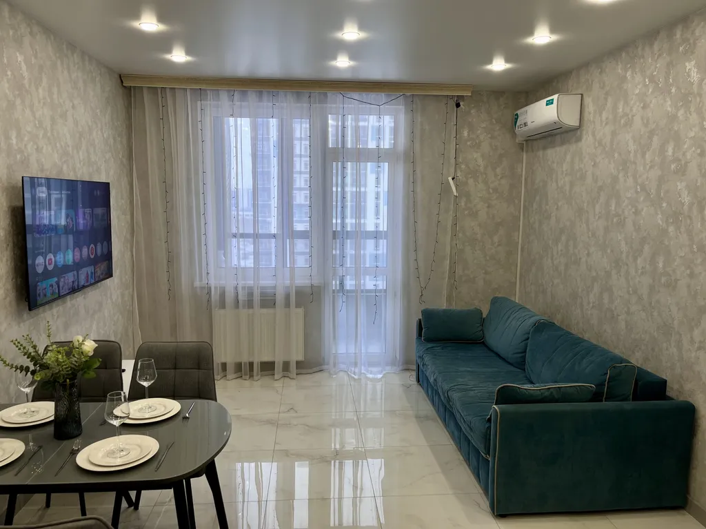 Просторная квартира со стильным интерьером и уютной атмосферой