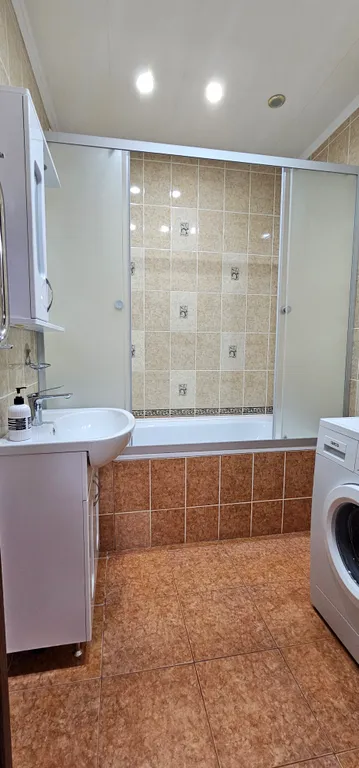 Современные трехкомнатные апартаменты на 14 этаже