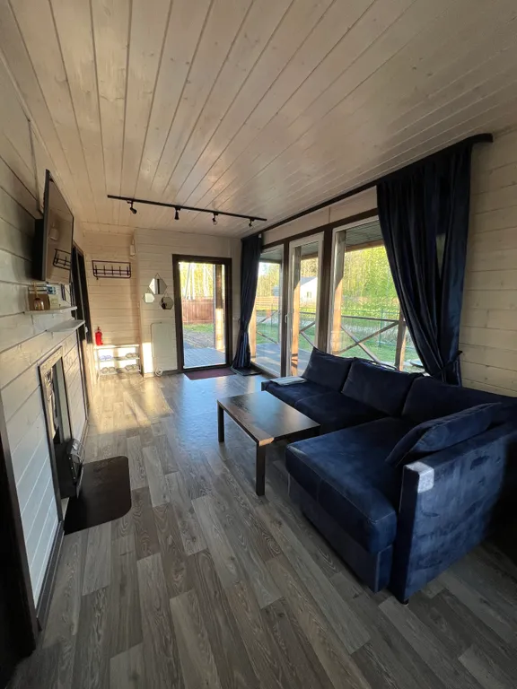 Коттедж Коттедж с сауной рядом с озером — Луга