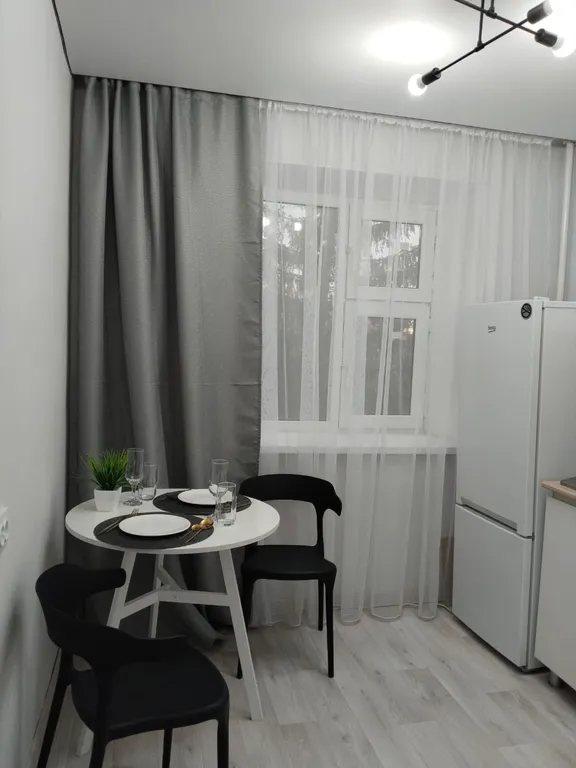 Квартира с видом на ели