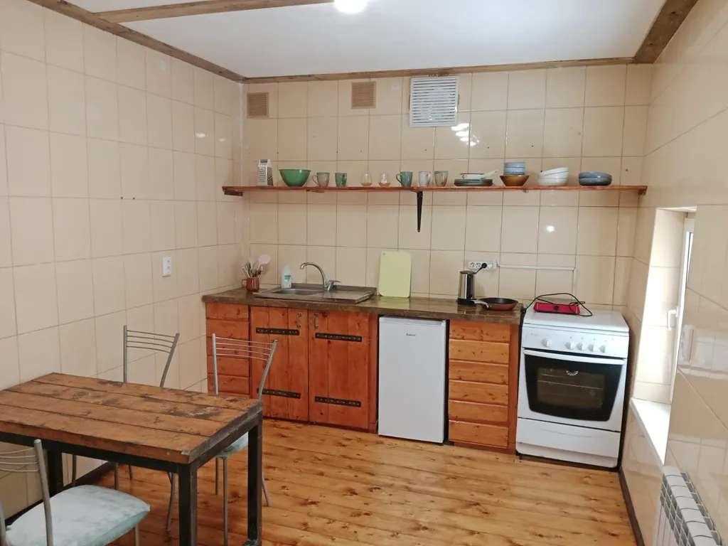 Домик с верандой в лесу