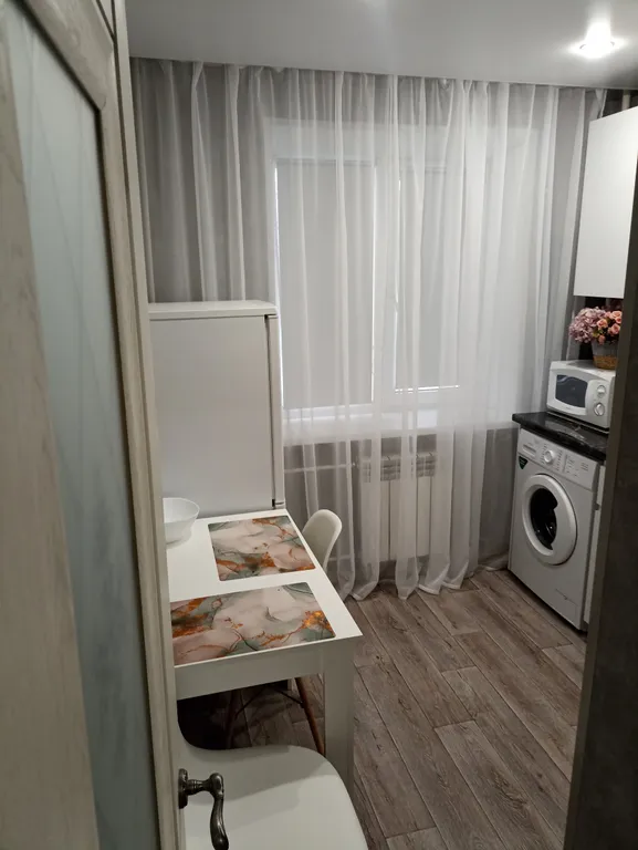 1-комнатная квартира в центре города с асфальтированной парковкой