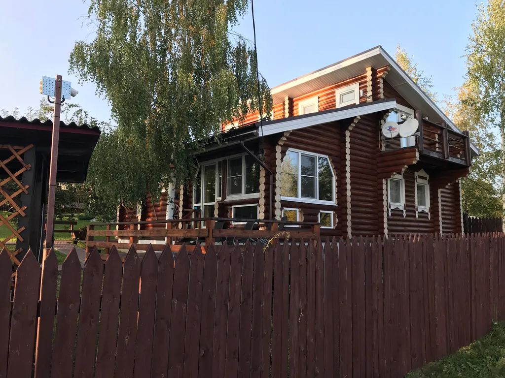 Дом из бревна Терем с сауной в черте города