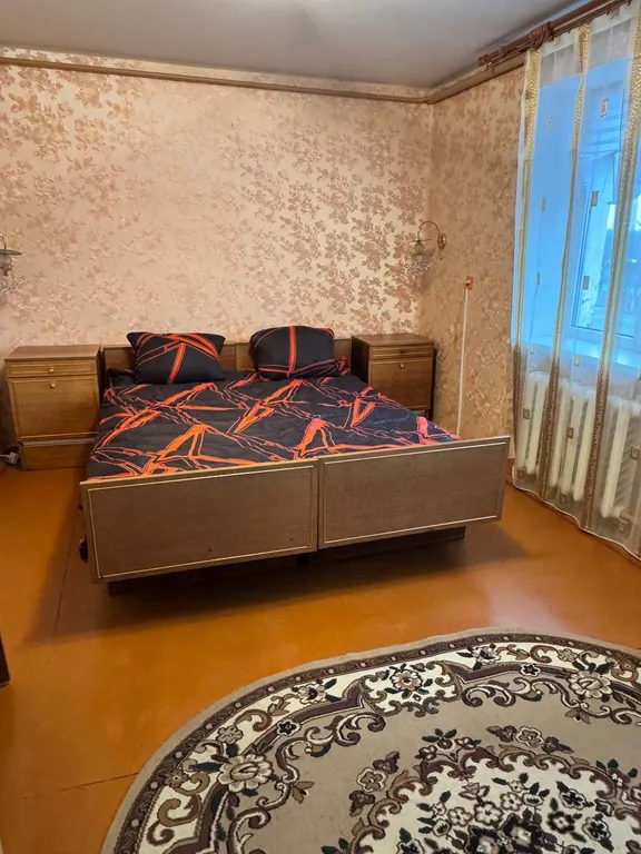 Трёхкомнатная двухуровневая квартира в центре города