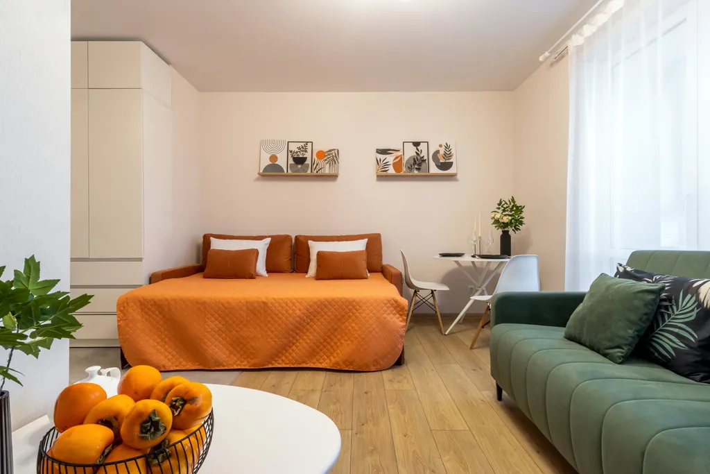 Студия Горизонты Нижнего Оранжево-изумрудный