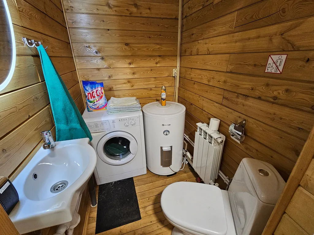 Таунхаус возле города с баней и купелью