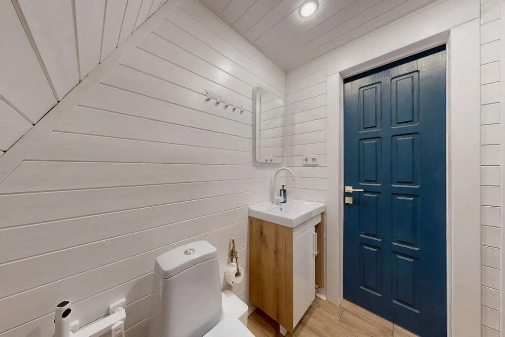 Дом в стиле a-frame с чаном на террасе