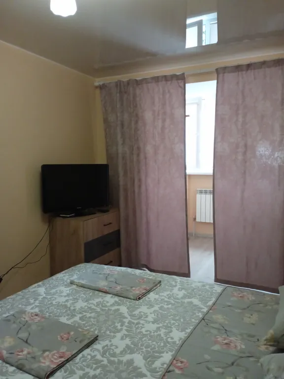 Квартира с видом на набережную и горы