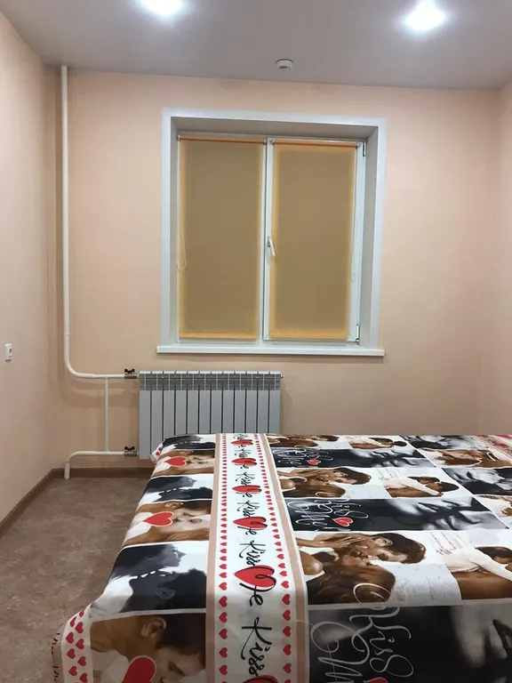 Уютная комната с двуспальной кроватью