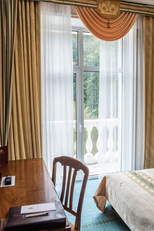 Номер 1-ой категории с видом на холм