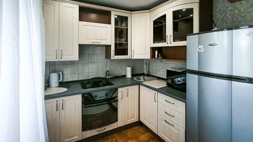 Квартира в самом центре, с огороженной парковкой.