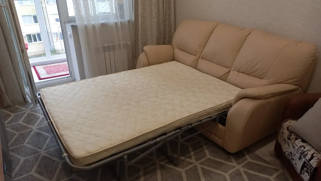 Квартира с магистральным фильтром, кухней-столовой и уютной спальней