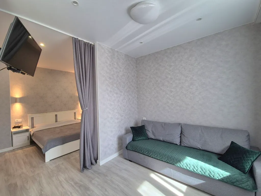 Уютная квартира Diamond в новом доме в центре города.