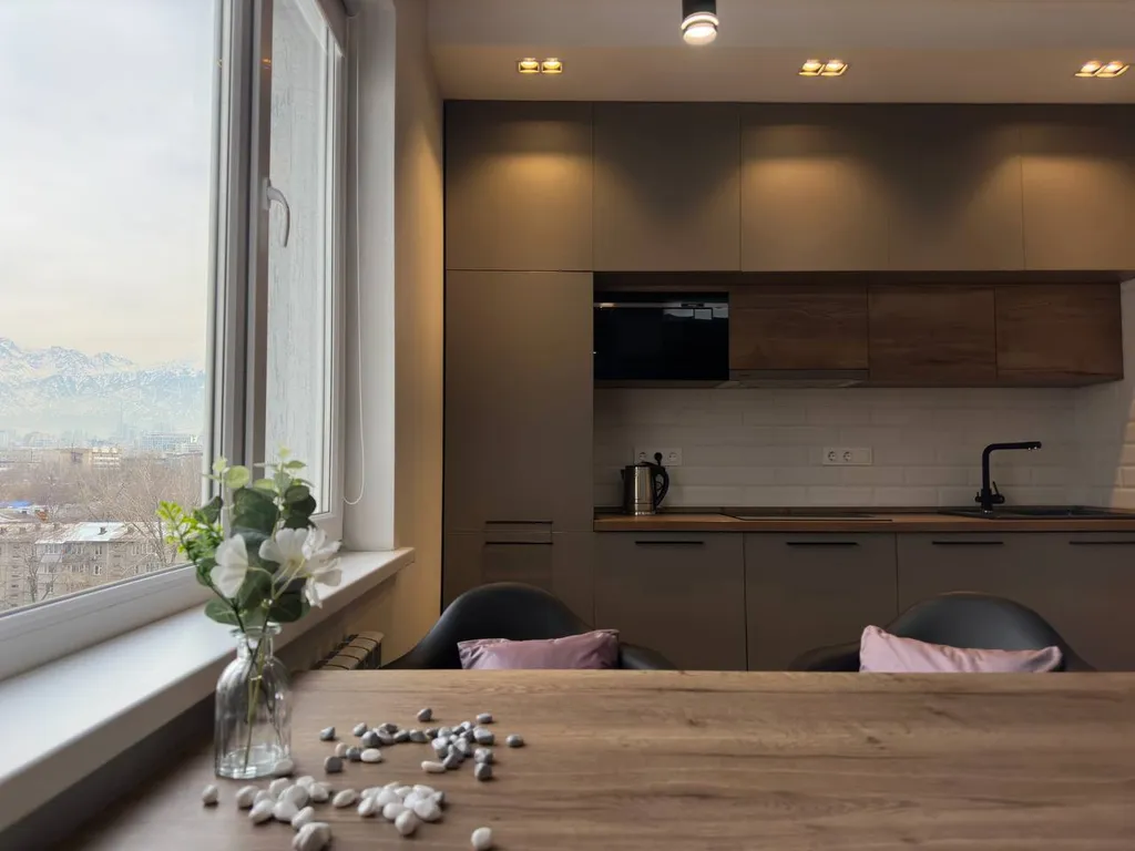 Квартира Студия в лофт стиле с видом на горы около арбата на 9 этаже — Алматы