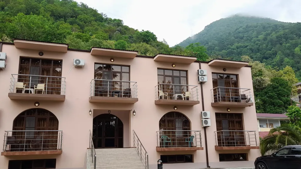 Номер делюкс с 2 отдельными кроватями, балконом и видом на горы