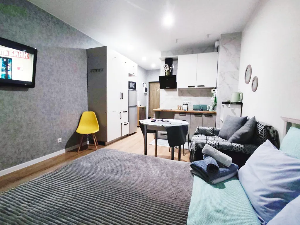 Студия loft с балконом