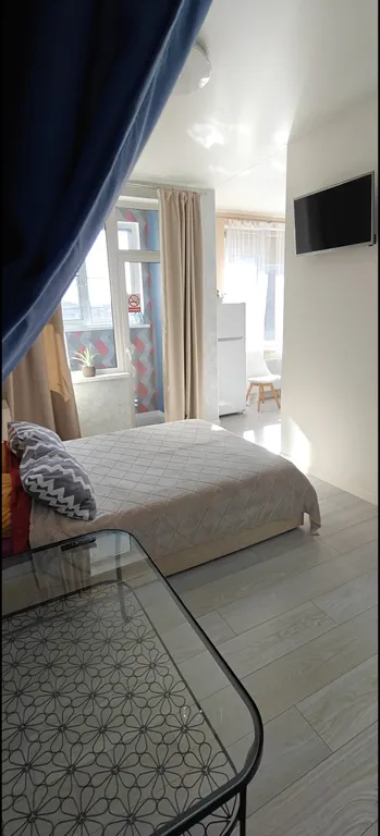 Уютная большая студия с балконом