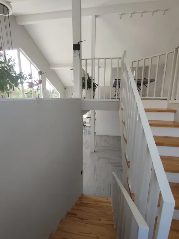 Современный дом с панорамными окнами и сауной