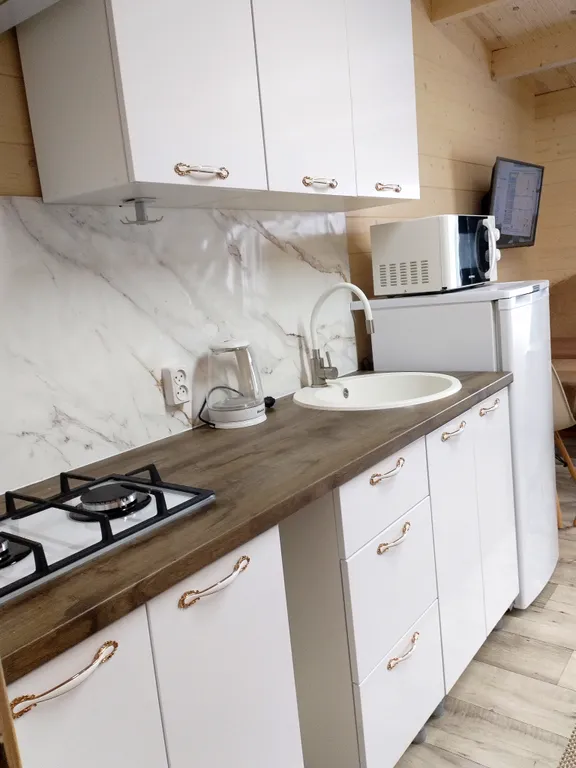 Уютный деревянный дом-бунгало