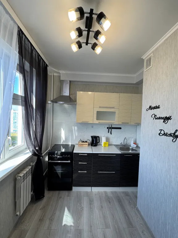 Апартаменты смотрящего с высоты на город