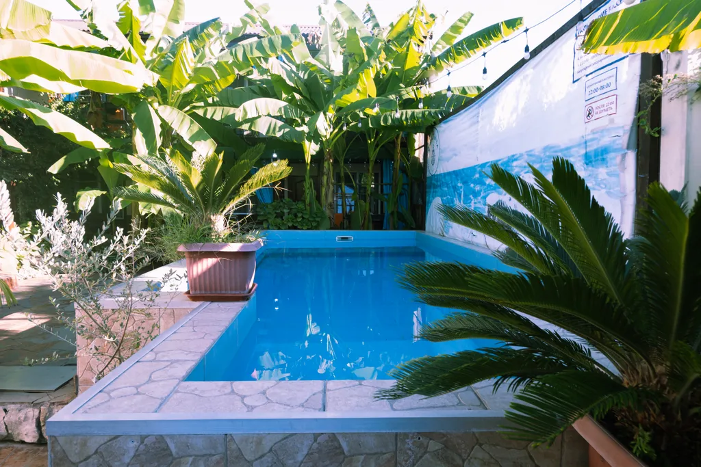 Трёхместный номер с 3 односпальными кроватями