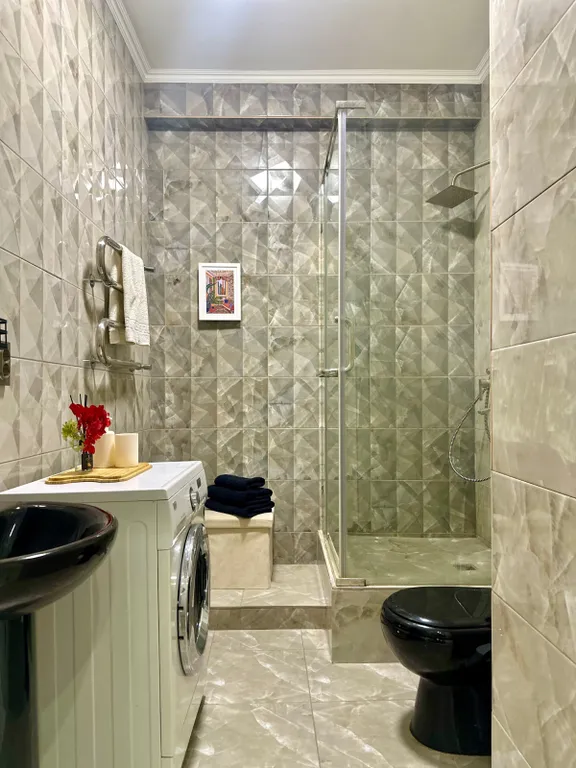 Квартира Уютная студия Нурай в центре Алматы — Алматы