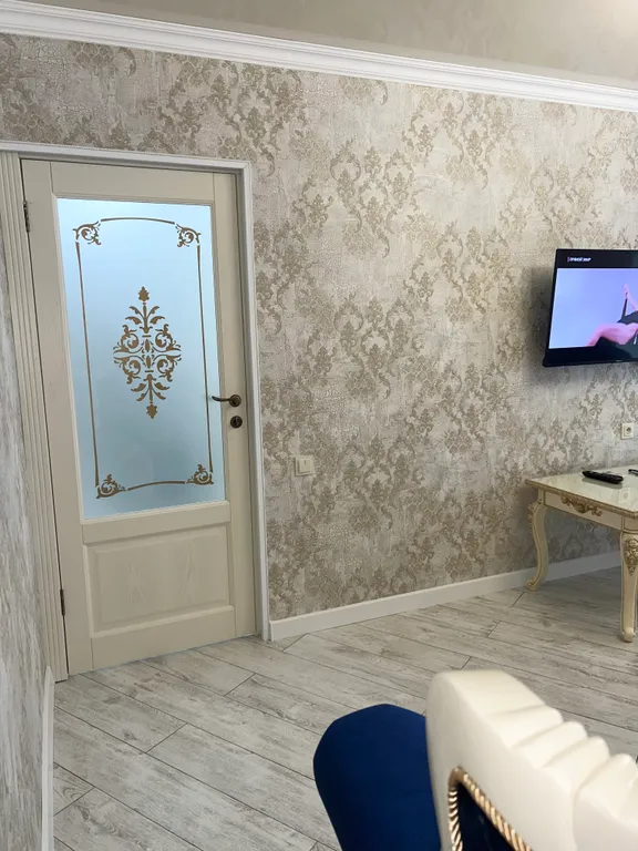 Апартамент с видом на море и на колесо обозрения