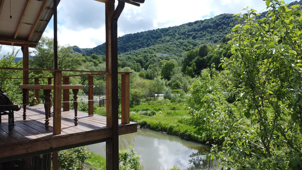 Коттедж Коттедж "Буковель" с терассой и видом на горы. — Архыз