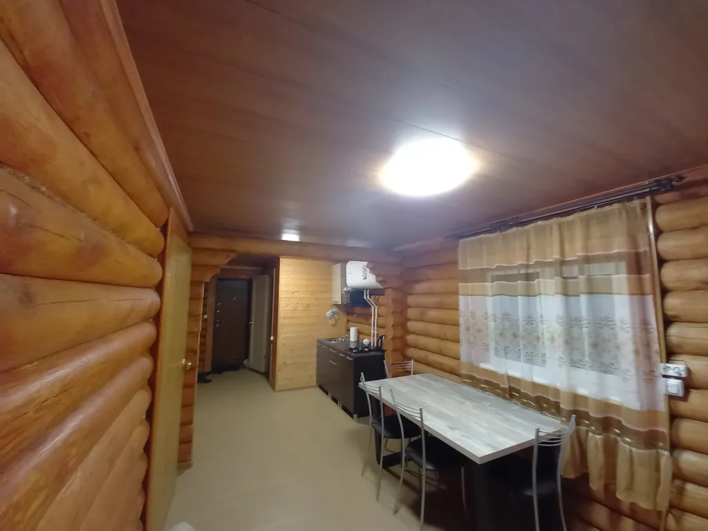 Домик из сосны в городе  С.