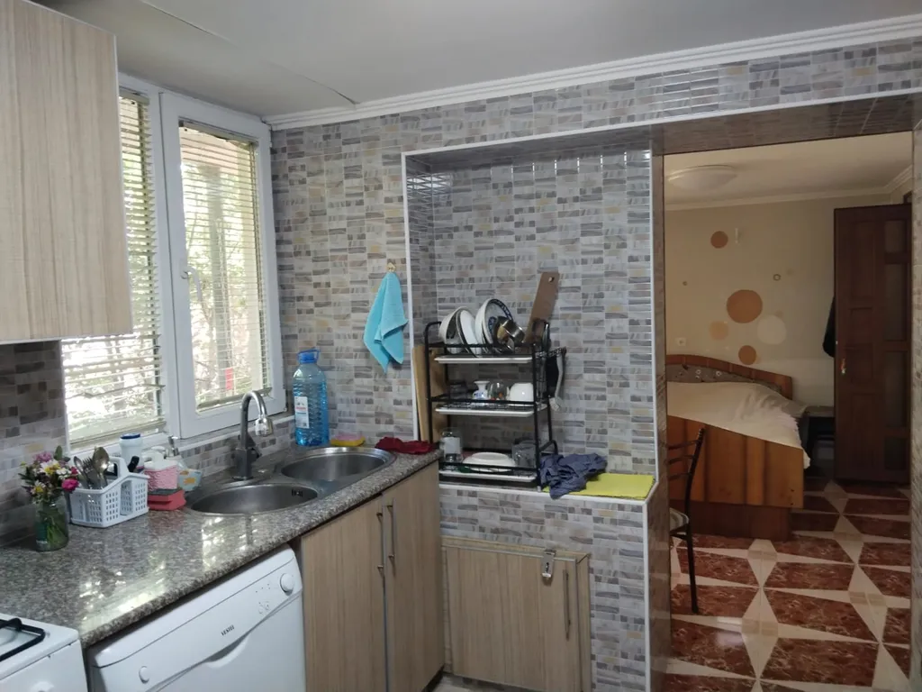 Апартаменты с большой кухней и выходом во двор