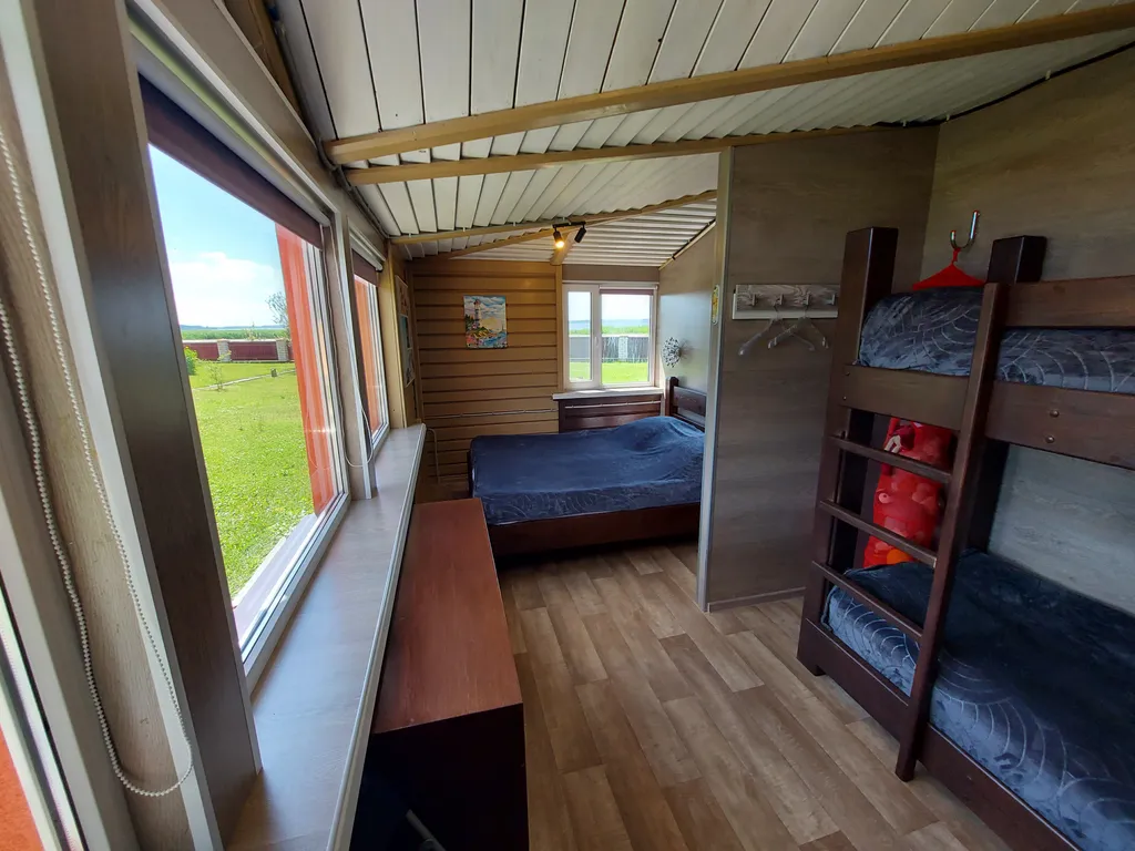 Уютный семейный коттедж с прекрасным видом на озеро Дривяты