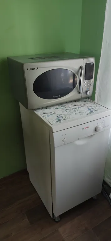 Уютный дом на берегу реки Великой