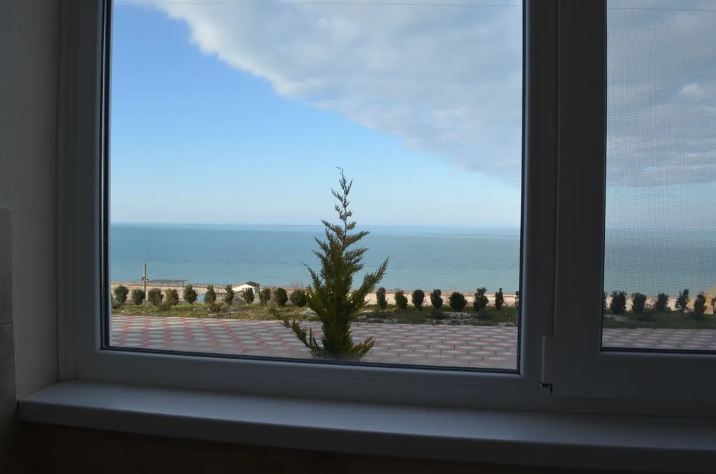 Комната с видом на море со всеми удобствами и отдельным входом